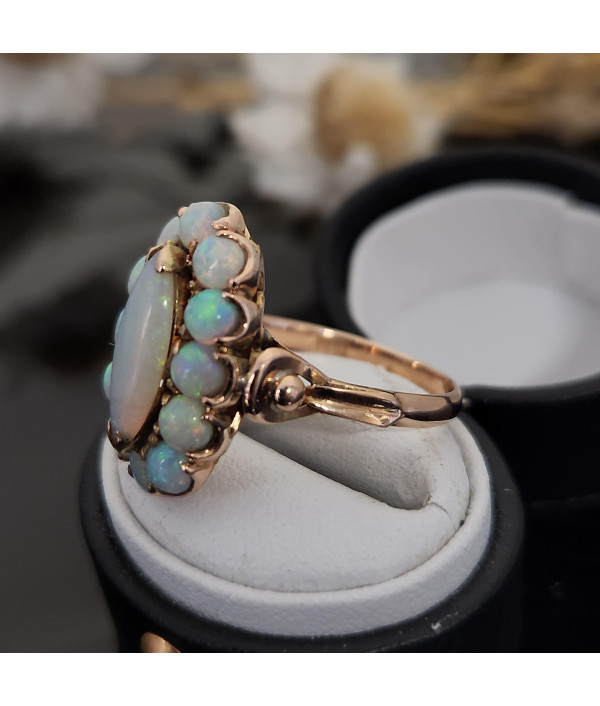 Vintage Solid Opal Halo Ring in 14k Yellow Gold Vintage Solid Opal Halo Ring in 14k Yellow Gold