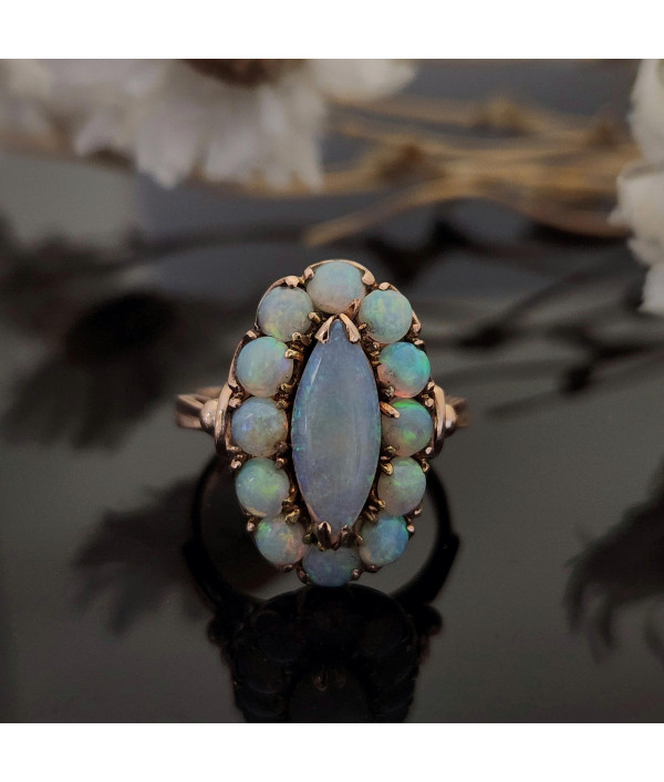 Vintage Solid Opal Halo Ring in 14k Yellow Gold Vintage Solid Opal Halo Ring in 14k Yellow Gold