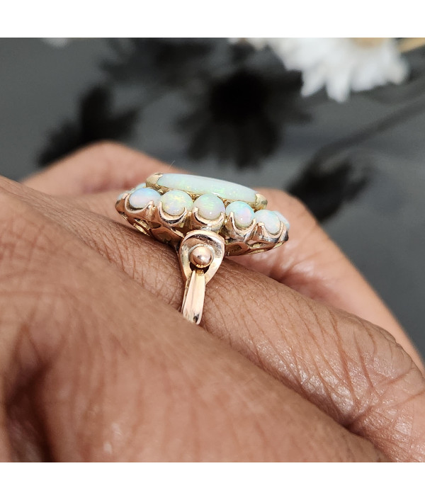 Vintage Solid Opal Halo Ring in 14k Yellow Gold Vintage Solid Opal Halo Ring in 14k Yellow Gold