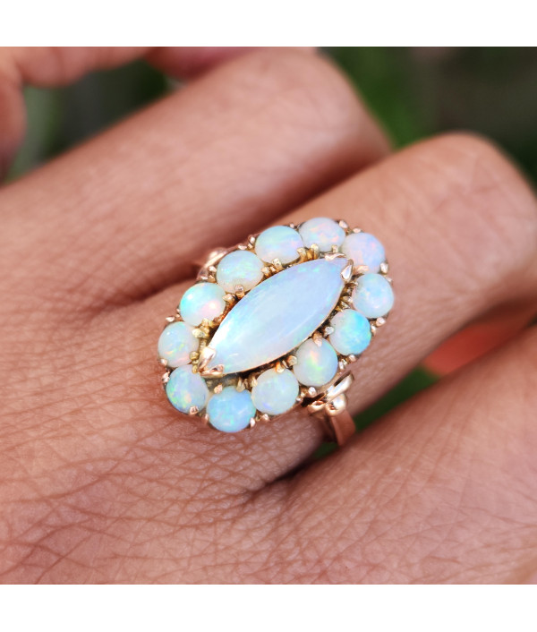 Vintage Solid Opal Halo Ring in 14k Yellow Gold Vintage Solid Opal Halo Ring in 14k Yellow Gold