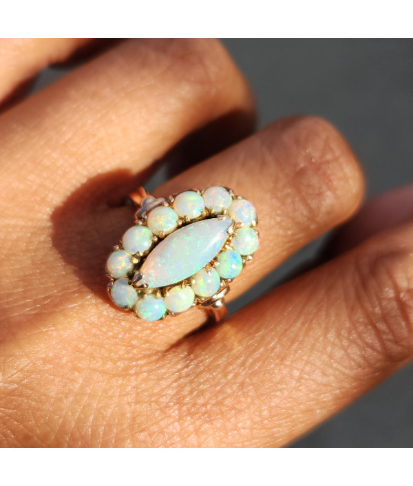 Vintage Solid Opal Halo Ring in 14k Yellow Gold Vintage Solid Opal Halo Ring in 14k Yellow Gold