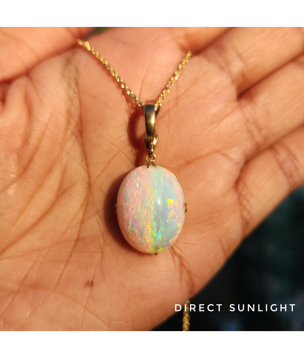 Australian Crystal Opal Pendant in 9k Gold with Enhancer Australian Crystal Opal Pendant in 9k Gold with Enhancer