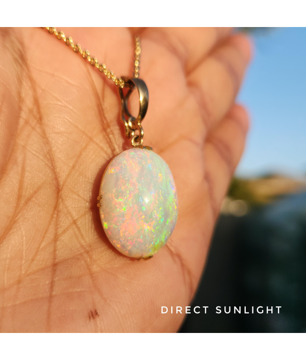 Australian Crystal Opal Pendant in 9k Gold with Enhancer Australian Crystal Opal Pendant in 9k Gold with Enhancer