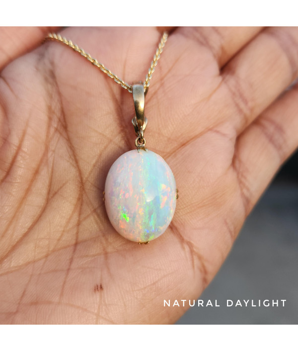 Australian Crystal Opal Pendant in 9k Gold with Enhancer Australian Crystal Opal Pendant in 9k Gold with Enhancer