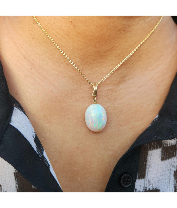 Australian Crystal Opal Pendant in 9k Gold with Enhancer Australian Crystal Opal Pendant in 9k Gold with Enhancer