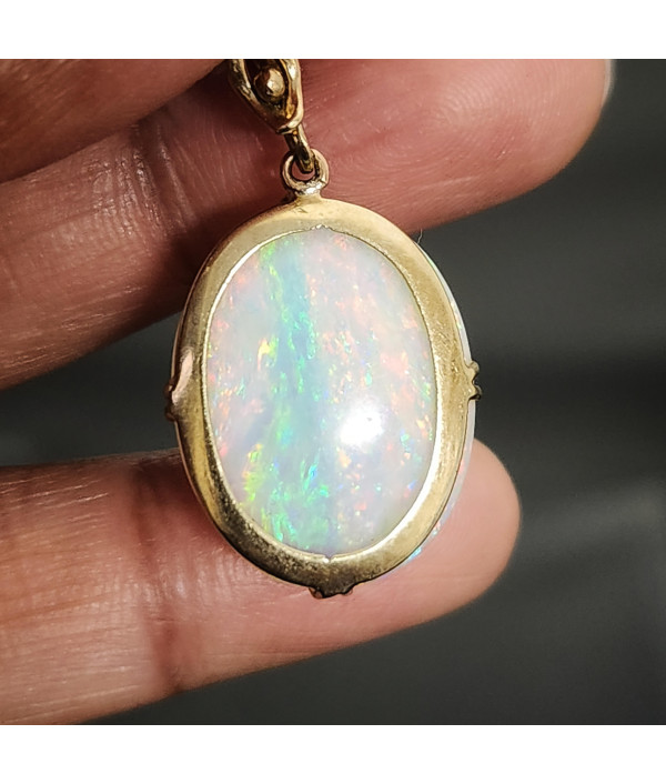 Australian Crystal Opal Pendant in 9k Gold with Enhancer Australian Crystal Opal Pendant in 9k Gold with Enhancer