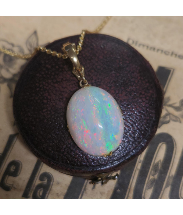 Australian Crystal Opal Pendant in 9k Gold with Enhancer Australian Crystal Opal Pendant in 9k Gold with Enhancer