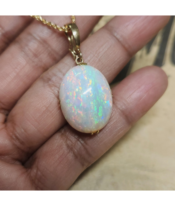 Australian Crystal Opal Pendant in 9k Gold with Enhancer Australian Crystal Opal Pendant in 9k Gold with Enhancer