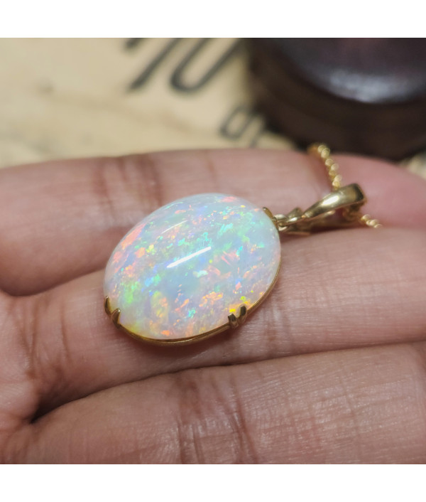 Australian Crystal Opal Pendant in 9k Gold with Enhancer Australian Crystal Opal Pendant in 9k Gold with Enhancer