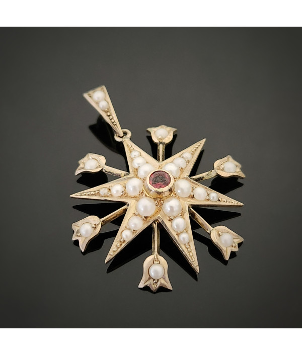 Antique Pearl And Garnet Starburst Pendant in 9ct Gold Antique Pearl And Garnet Starburst Pendant in 9ct Gold