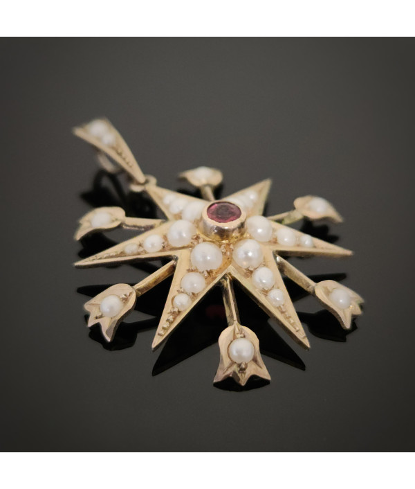 Antique Pearl And Garnet Starburst Pendant in 9ct Gold Antique Pearl And Garnet Starburst Pendant in 9ct Gold