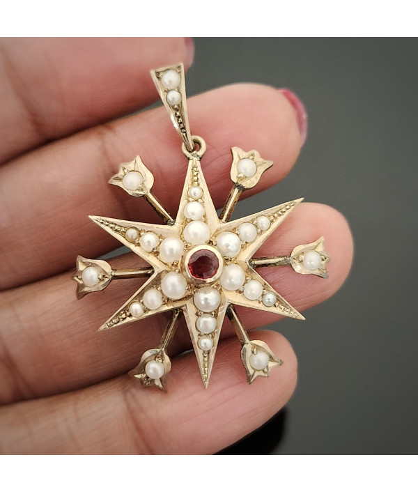 Antique Pearl And Garnet Starburst Pendant in 9ct Gold Antique Pearl And Garnet Starburst Pendant in 9ct Gold