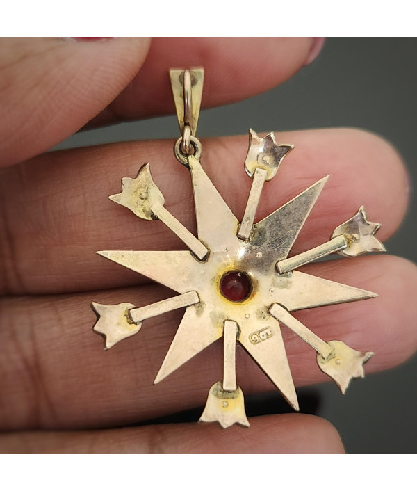Antique Pearl And Garnet Starburst Pendant in 9ct Gold Antique Pearl And Garnet Starburst Pendant in 9ct Gold