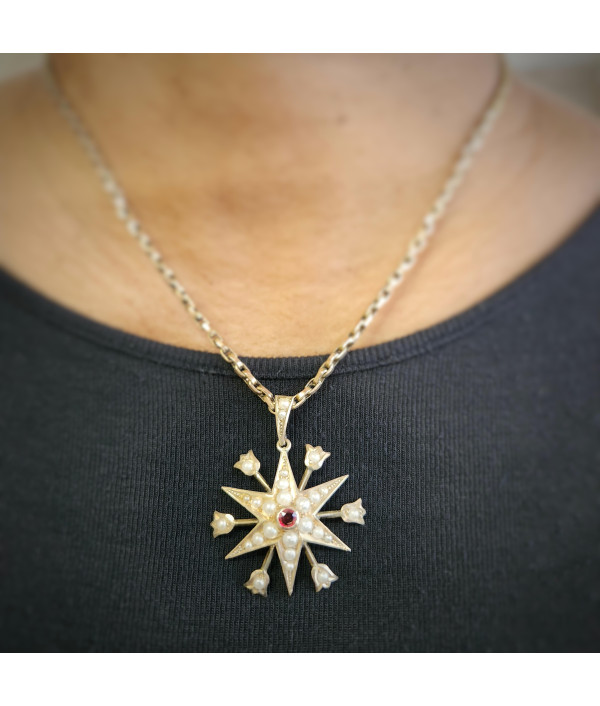 Antique Pearl And Garnet Starburst Pendant in 9ct Gold Antique Pearl And Garnet Starburst Pendant in 9ct Gold