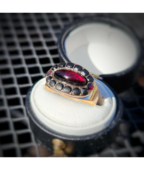 Georgian Garnet Cabochon and Jet Halo Ring in 9ct Gold Georgian Garnet Cabochon and Jet Halo Ring in 9ct Gold