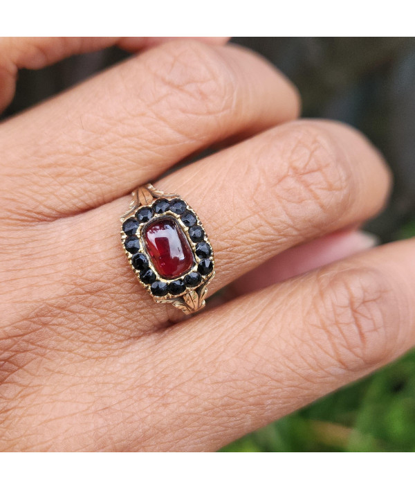Victorian Garnet Carbuncle and Jet Mourning Ring in 12k Gold Victorian Garnet Carbuncle and Jet Mourning Ring in 12k Gold