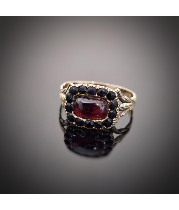 Victorian Garnet Carbuncle and Jet Mourning Ring in 12k Gold Victorian Garnet Carbuncle and Jet Mourning Ring in 12k Gold