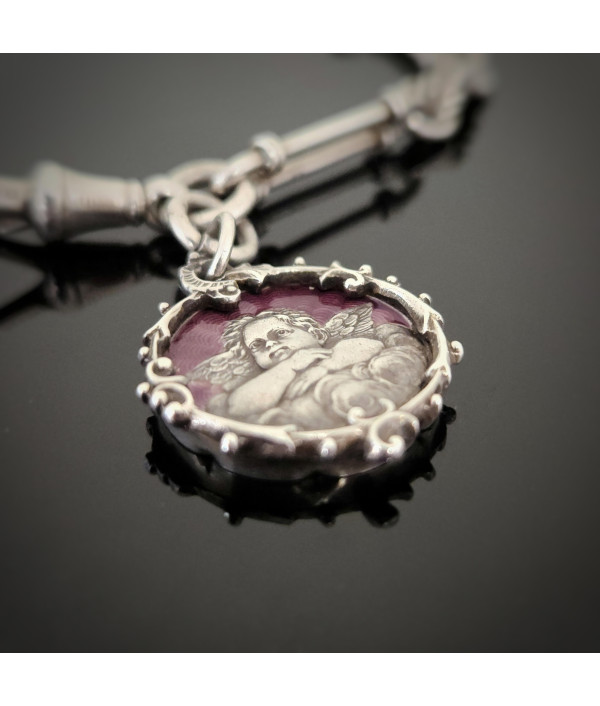 Antique Sterling Silver Trombone and Lover’s Knot Albert Chain Bracelet with Enamelled Cherub Charm Antique Sterling Silver Trombone and Lover’s Knot Albert Chain Bracelet with Enamelled Cherub Charm