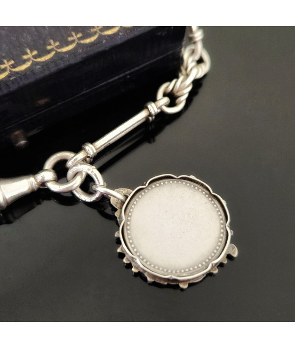 Antique Sterling Silver Trombone and Lover’s Knot Albert Chain Bracelet with Enamelled Cherub Charm Antique Sterling Silver Trombone and Lover’s Knot Albert Chain Bracelet with Enamelled Cherub Charm