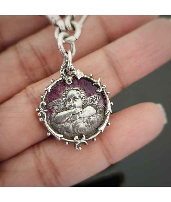 Antique Sterling Silver Trombone and Lover’s Knot Albert Chain Bracelet with Enamelled Cherub Charm Antique Sterling Silver Trombone and Lover’s Knot Albert Chain Bracelet with Enamelled Cherub Charm
