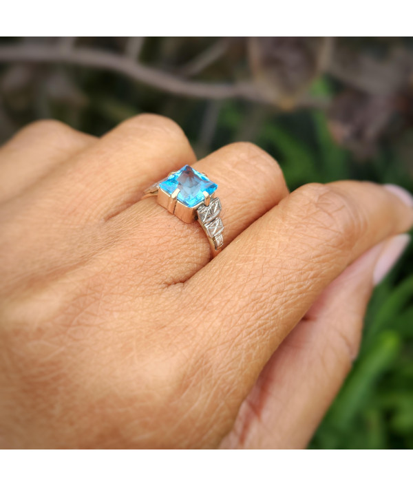 Art Deco 9ct Rose Gold And Platinum Swiss Blue Topaz Ring Art Deco 9ct Rose Gold And Platinum Swiss Blue Topaz Ring
