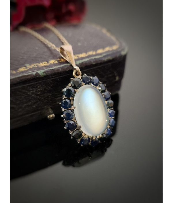 Antique Moonstone And Sapphire Halo Pendant in 9ct Gold Antique Moonstone And Sapphire Halo Pendant in 9ct Gold