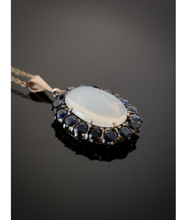 Antique Moonstone And Sapphire Halo Pendant in 9ct Gold Antique Moonstone And Sapphire Halo Pendant in 9ct Gold
