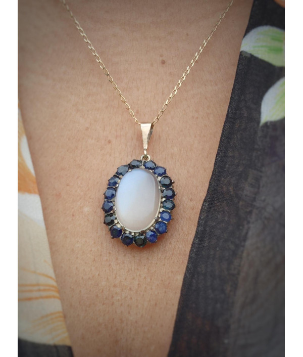 Antique Moonstone And Sapphire Halo Pendant in 9ct Gold Antique Moonstone And Sapphire Halo Pendant in 9ct Gold