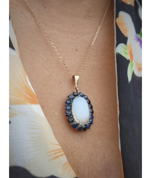 Antique Moonstone And Sapphire Halo Pendant in 9ct Gold Antique Moonstone And Sapphire Halo Pendant in 9ct Gold